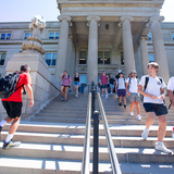 Students walking down the steps of Curtiss Hall 