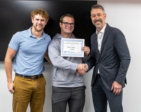 Grant Veenstra and Zane Lenz receiving grant from Story County Community Foundation