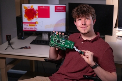 Chase O’Connell in a Coover Hall lab.